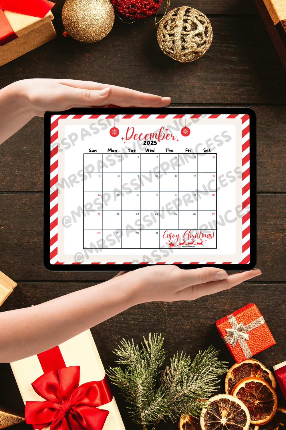 Festive December 2025 Calendar Printable with red and white candy-cane border, minimalist design, Christmas ornaments, and Santa sleigh illustration. Perfect for holiday planning, Christmas countdowns, and cozy seasonal decor.
